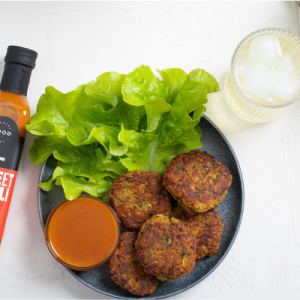 Hemp & lentil bites on a plate with Hemp Oil Sweet Chilli Dressing