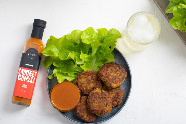 Hemp & lentil bites on a plate with Hemp Oil Sweet Chilli Dressing